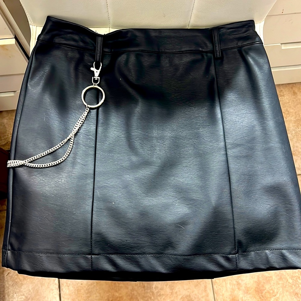 Mini black leather skirt